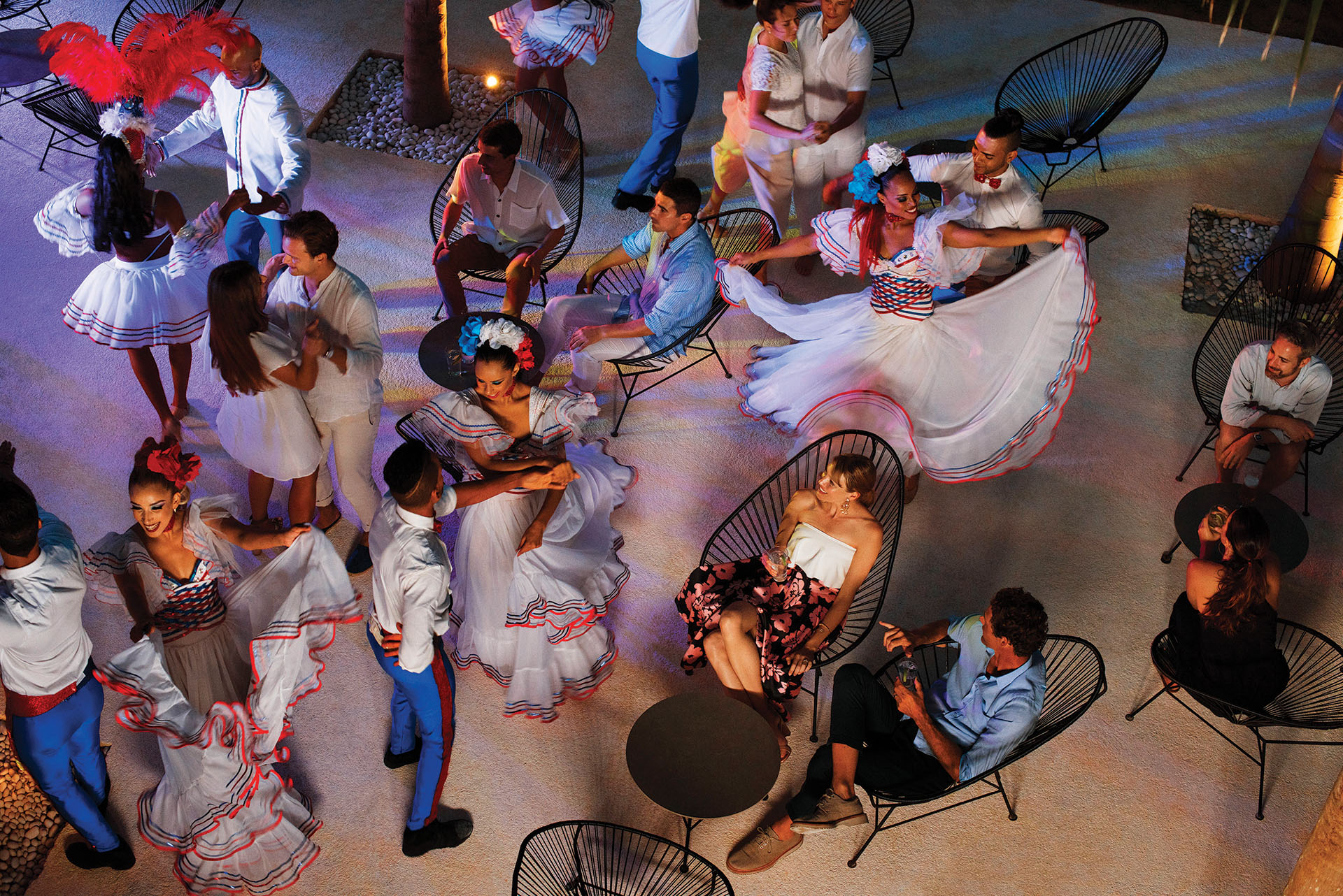 Couple experiencing the national dances of the Dominican Republic Couple experiencing the national dances of the Dominican Republic